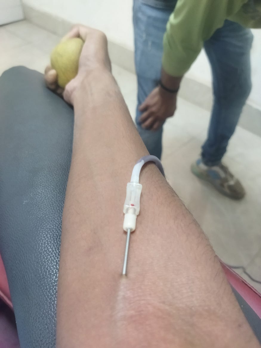 Navneet donating blood